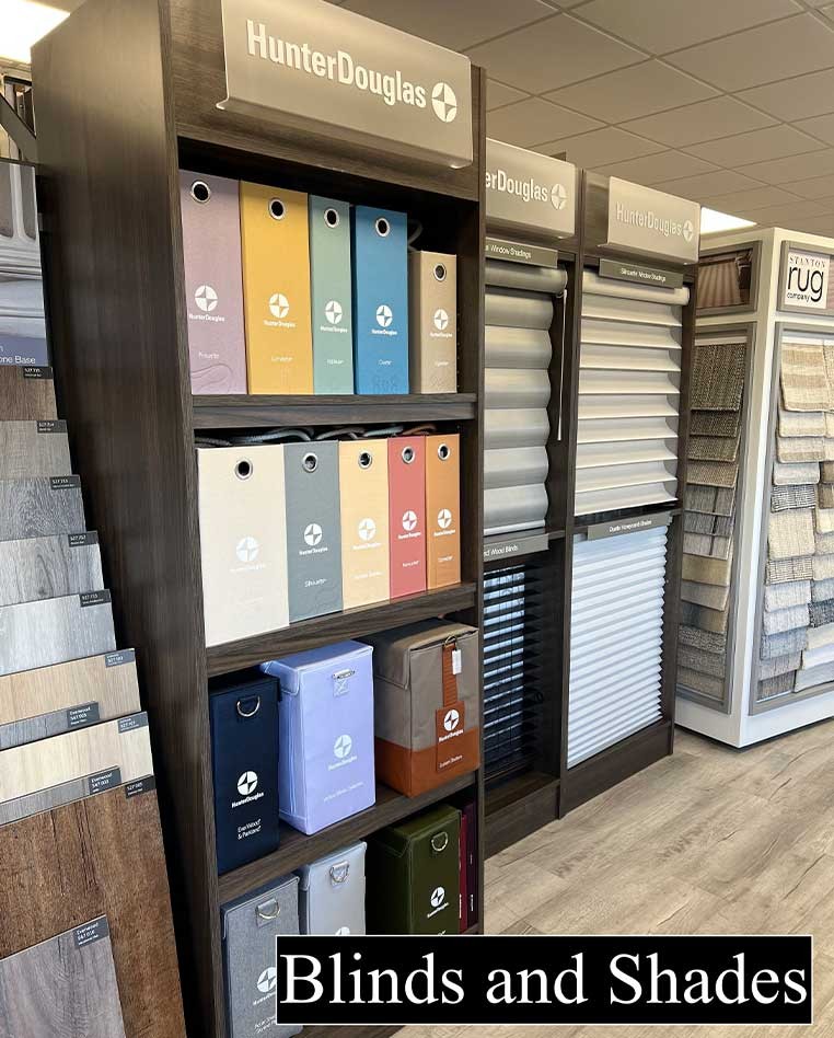 Store interior showcasing several different types of window coverings